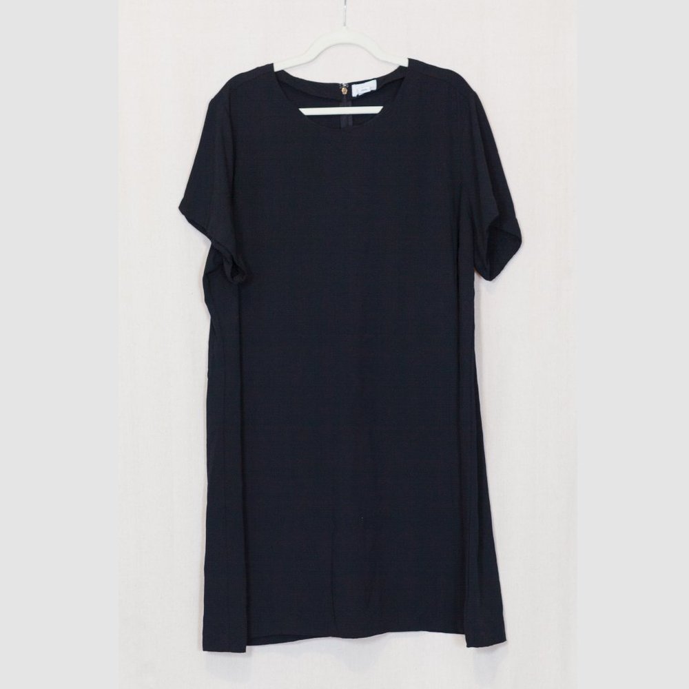 Simple elegant knee length boxy black dress
